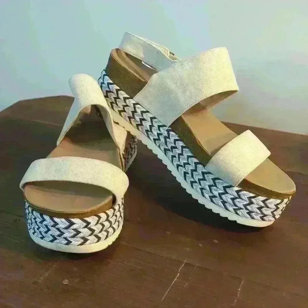 Skechers women's platform sandal with blue and white cording around bottom sz6